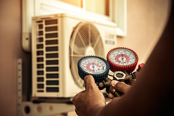 Professional Ac Installation technician working in Harwood, MD